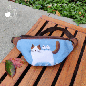 RIÑONERA  CON DISEÑO DE GATO CON PAJARITOS